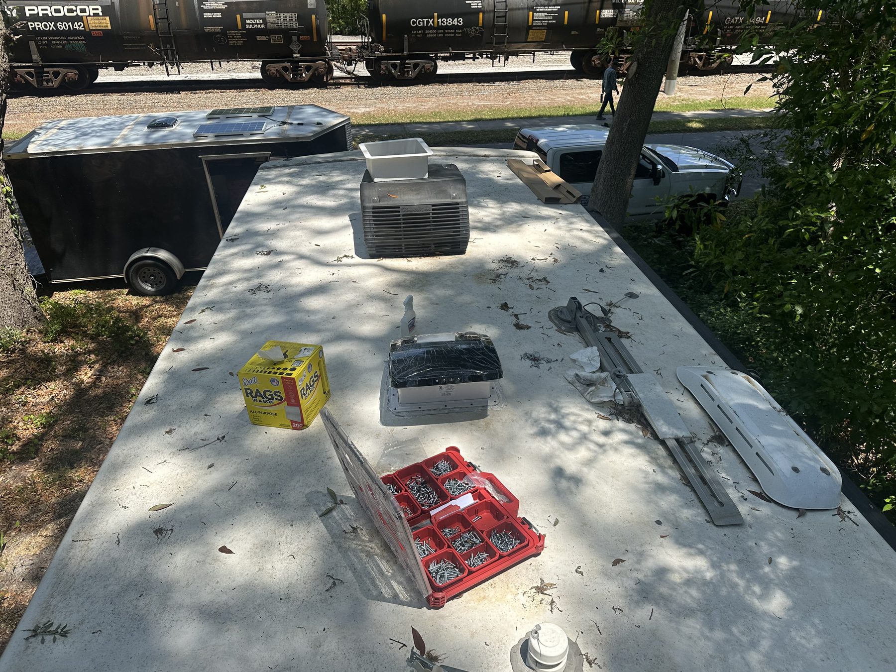 RV roof vent and sealant repair supplies on roof